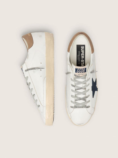 Super-Star en cuir blanc avec étoile en toile bleu nuit et contrefort en cuir couleur tabac
