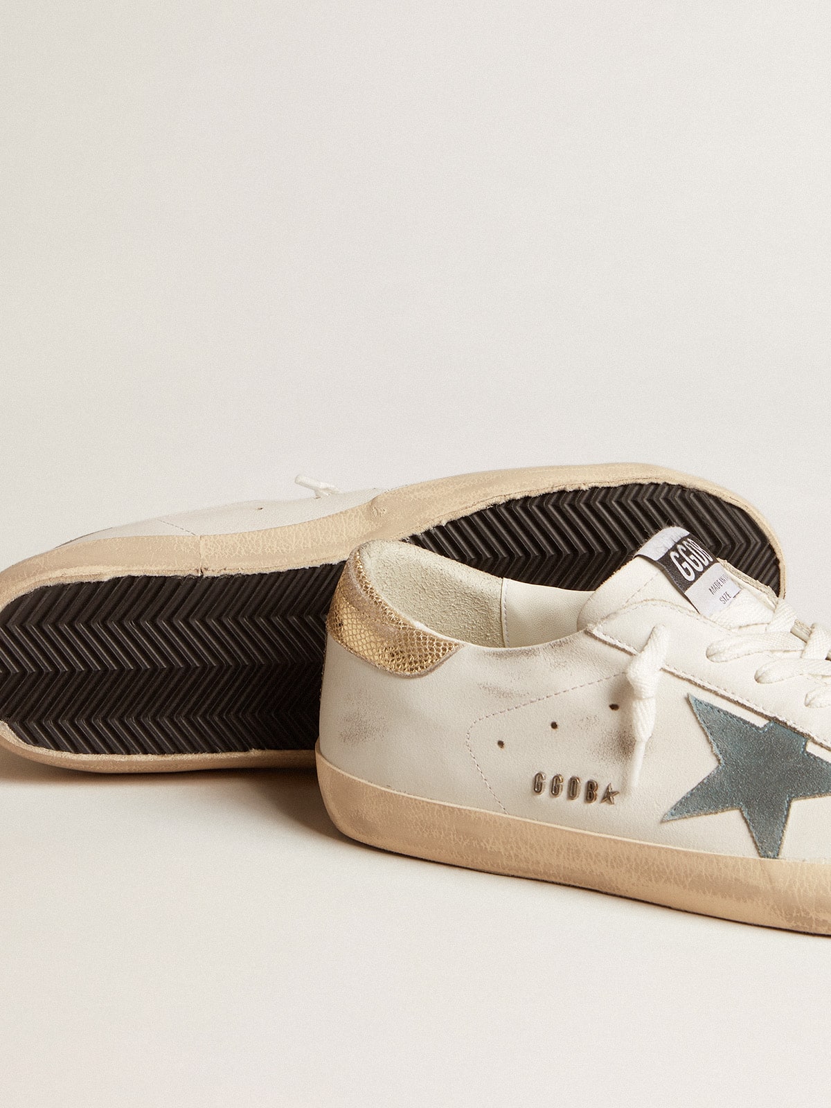 Super-Star avec étoile en daim et contrefort en cuir python platine