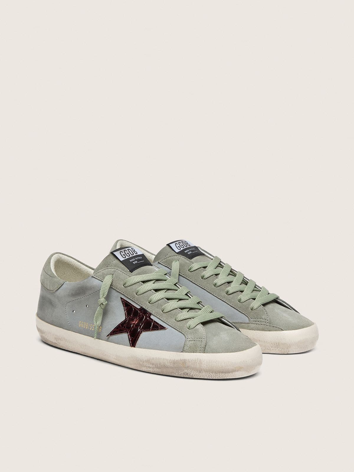 Super-Star homme en cuir bleu ciel clair avec étoile bordeaux imprimée croco