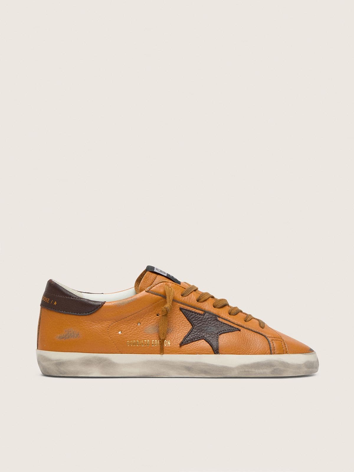 Super-Star LTD homme en cuir orange avec étoile marron