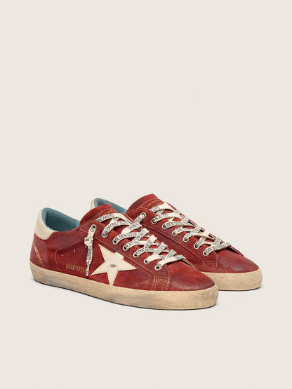 Super-Star homme en cuir velours rouge avec étoile en cuir crème