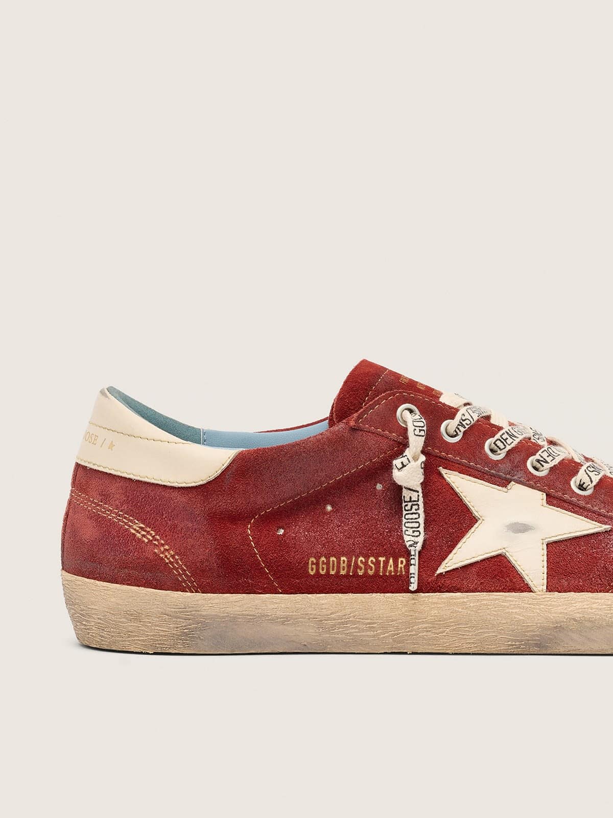 Super-Star homme en cuir velours rouge avec étoile en cuir crème