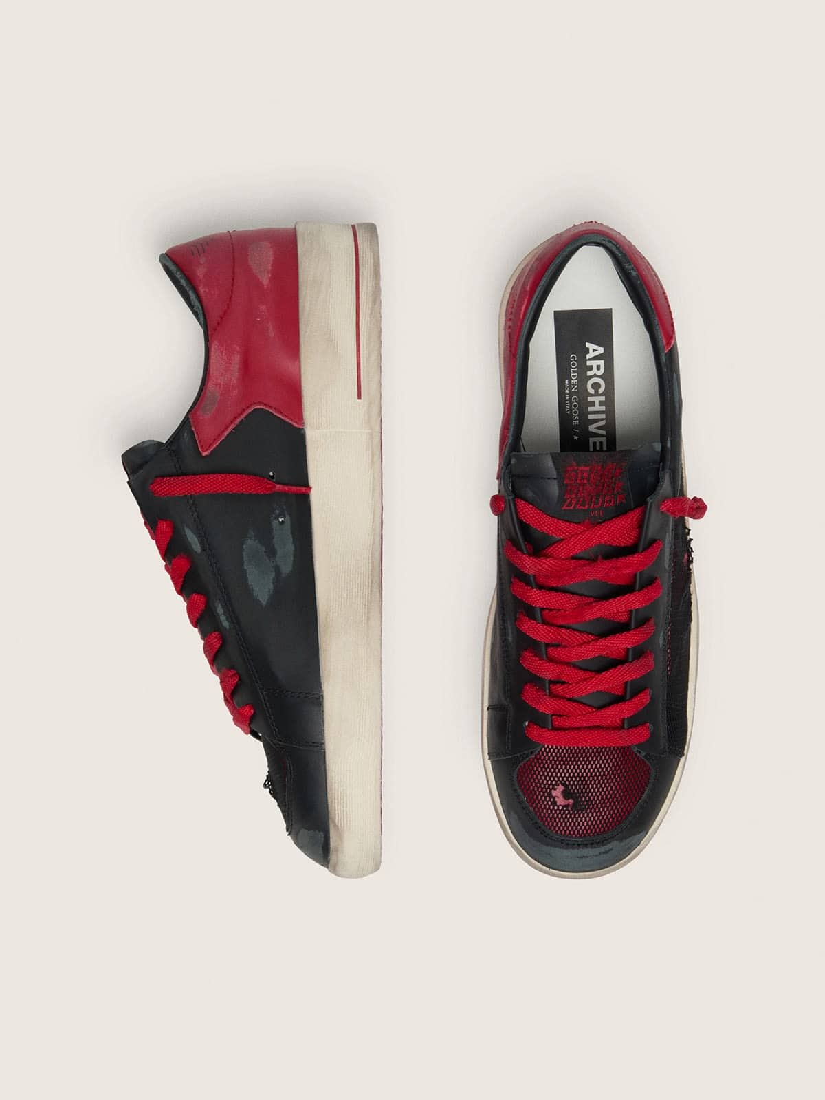 Stardan homme en cuir noir avec étoile en cuir rouge et empiècements en résille noire et cuir rouge
