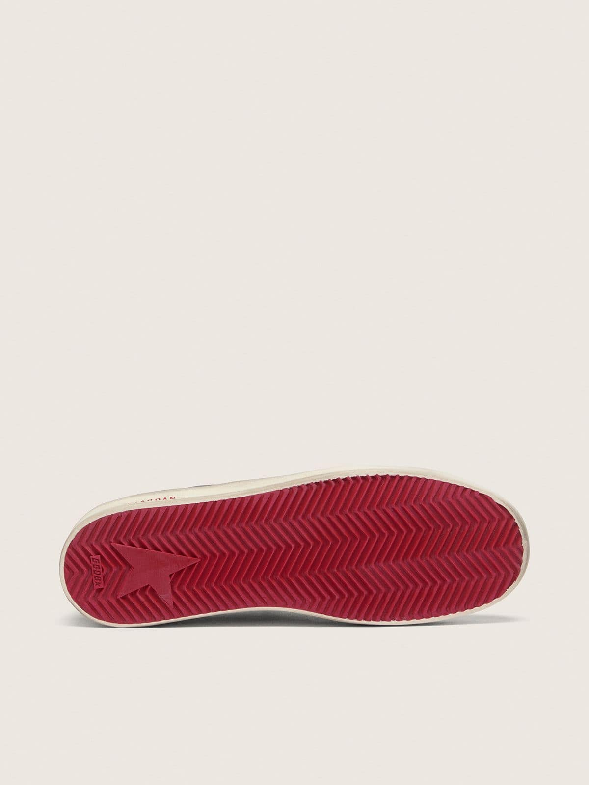Stardan homme en cuir noir avec étoile en cuir rouge et empiècements en résille noire et cuir rouge