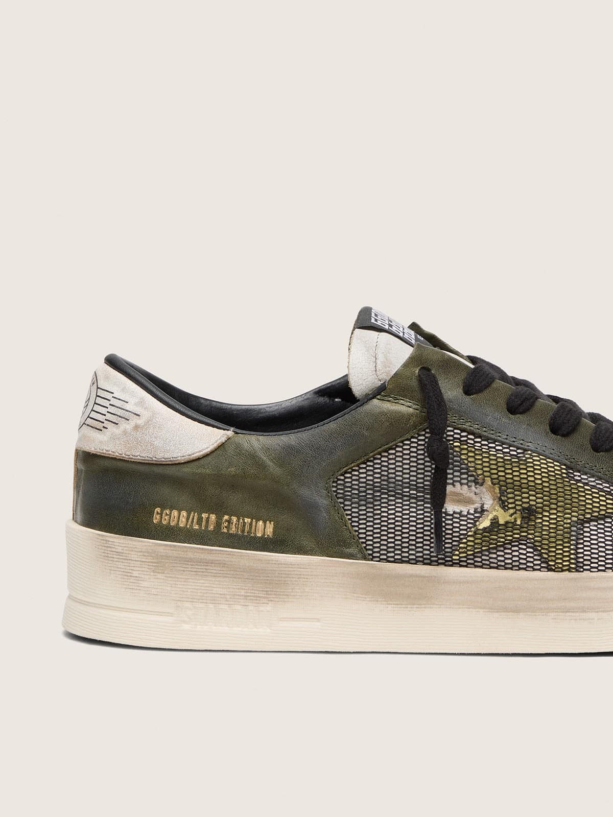 Stardan LTD homme en cuir blanc et vert olive avec résille noire et étoile en cuir jaune