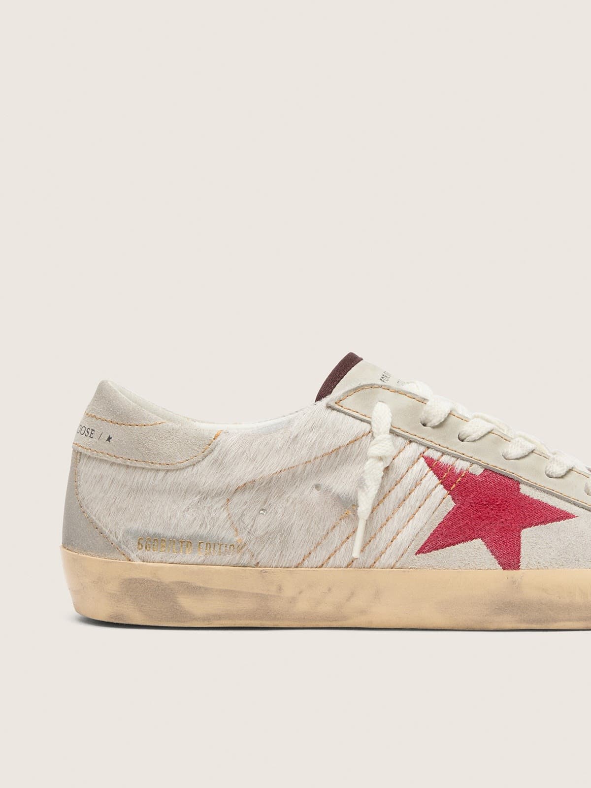 Super-Star LTD homme en cuir façon poulain blanc avec étoile en cuir velours rouge