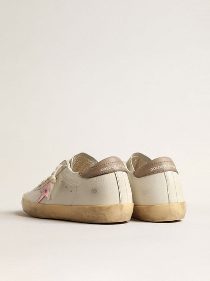 Super-Star pour femme en cuir nappa blanc avec étoile en cuir métallisé rose