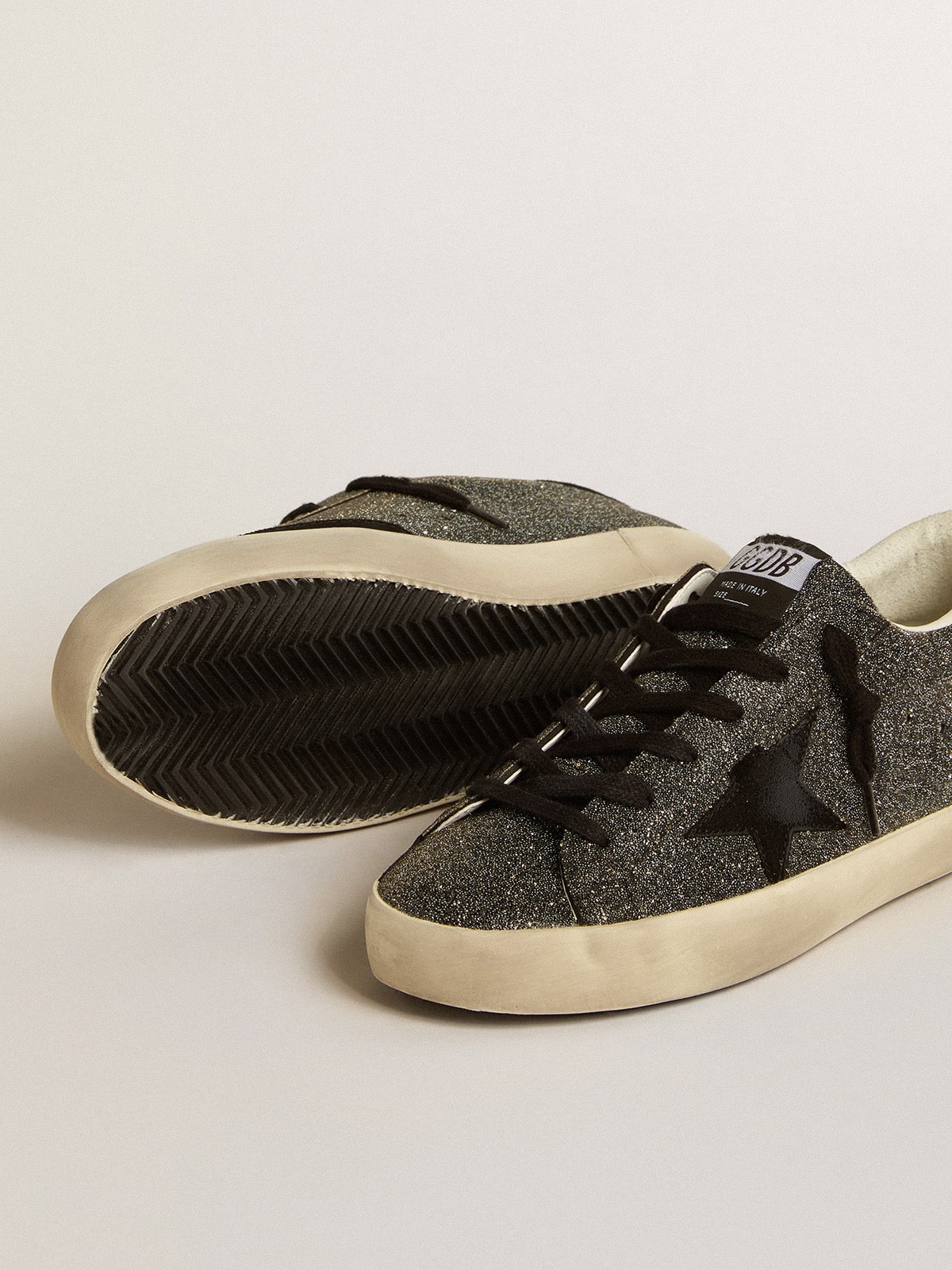 Super-Star pour femme en cristaux Swarovski noirs avec étoile en daim noir