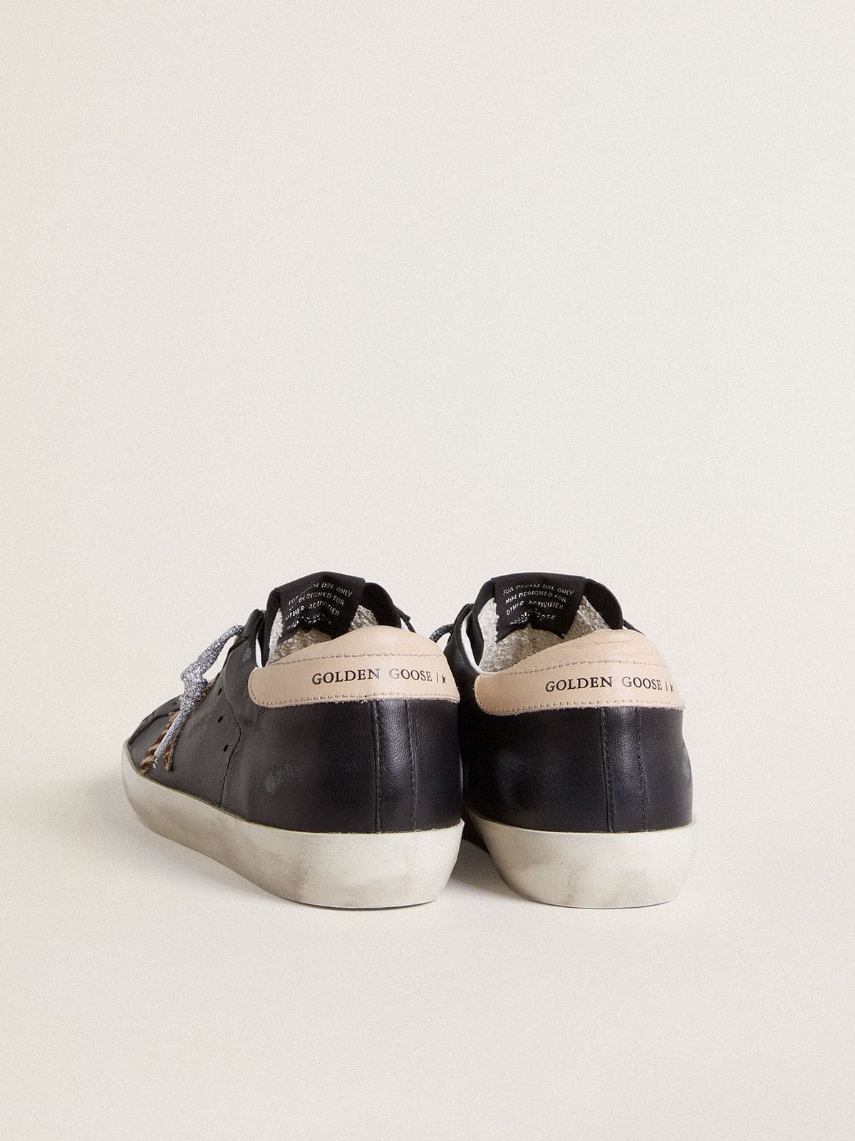 Super-Star pour femme en cuir nappa noir avec étoile en cuir façon poulain à imprimé zèbre et contrefort en cuir beige