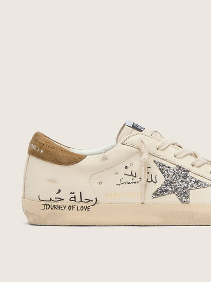Super-Star pour femme en cuir nappa avec étoile à paillettes argentées et lettrage intégral