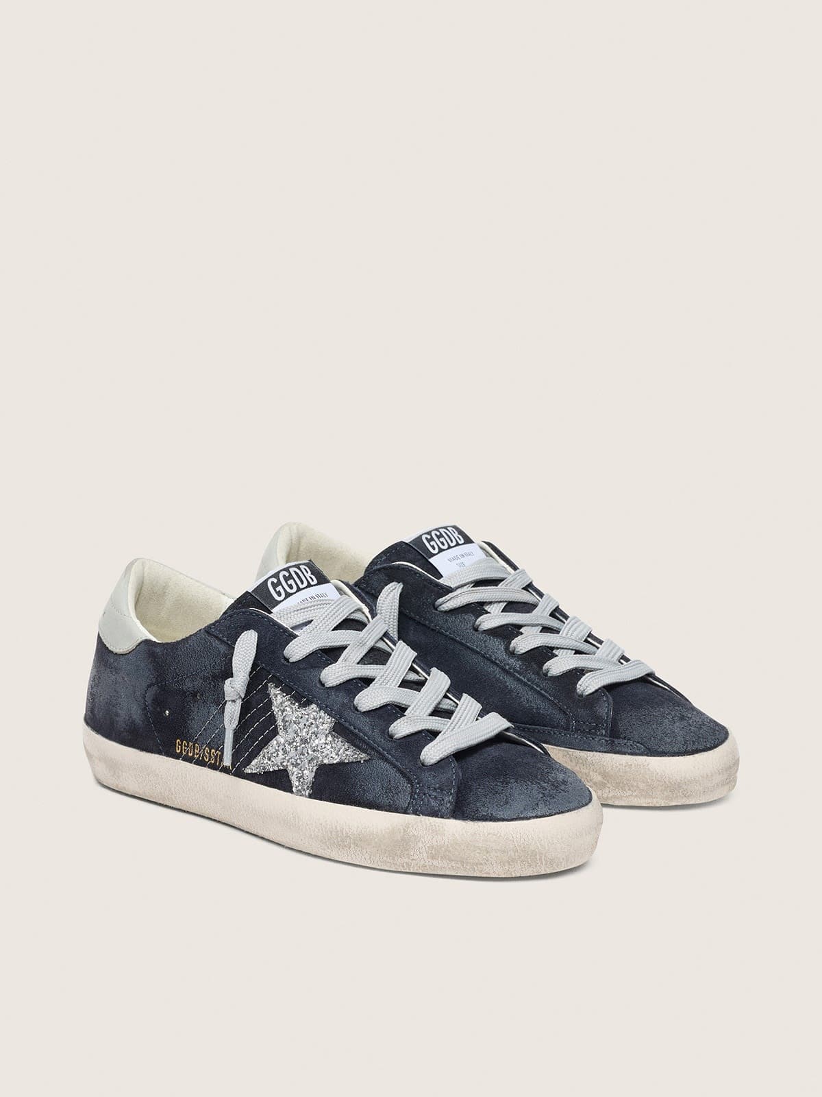 Super-Star pour femme en daim bleu avec étoile à paillettes argentées et contrefort en cuir