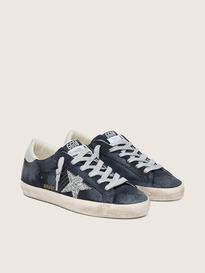 Super-Star pour femme en daim bleu avec étoile à paillettes argentées et contrefort en cuir