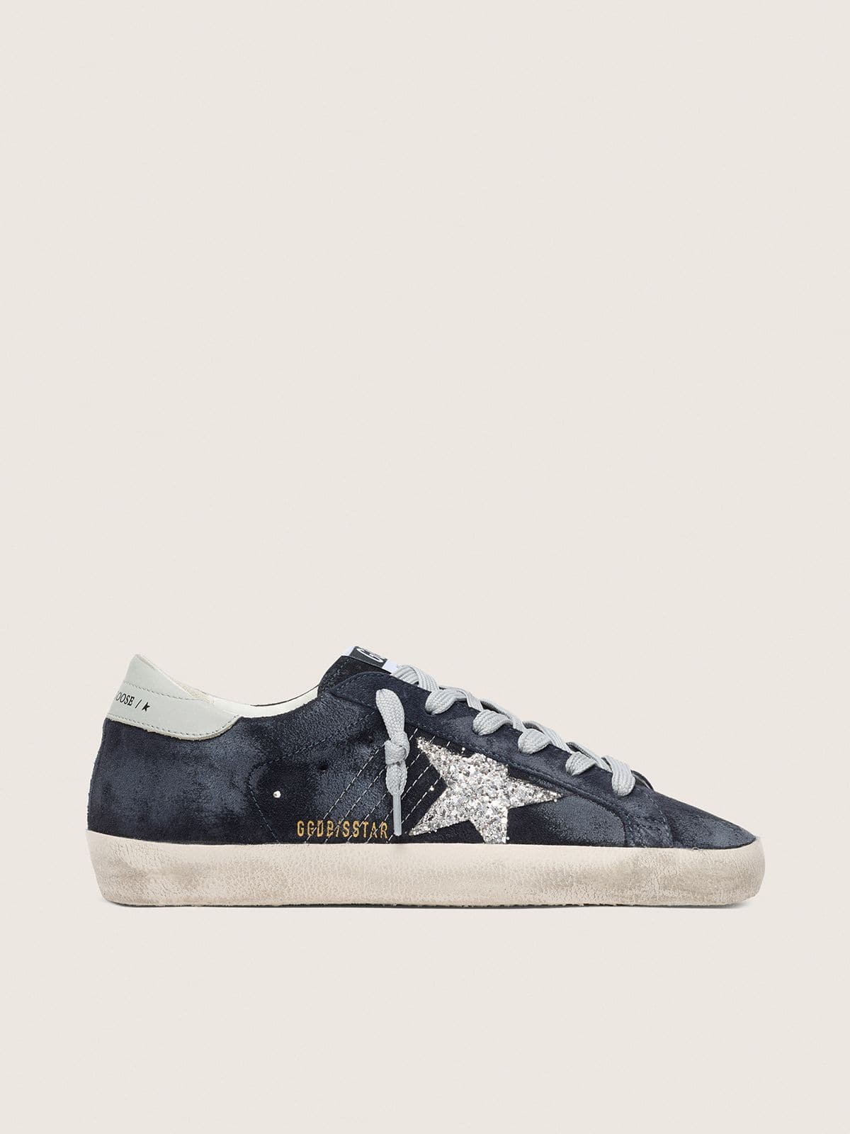 Super-Star pour femme en daim bleu avec étoile à paillettes argentées et contrefort en cuir