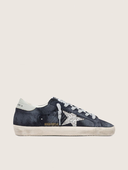 Super-Star pour femme en daim bleu avec étoile à paillettes argentées et contrefort en cuir
