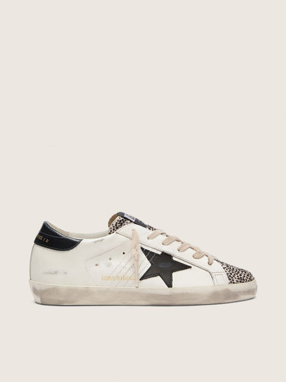 Super-Star LTD pour femme en cuir blanc avec étoile noire et détails en cuir façon poulain