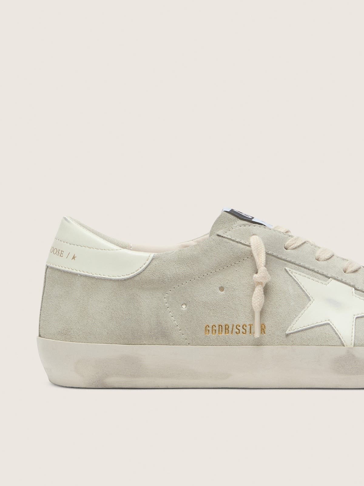 Super-Star pour femme en daim gris clair avec étoile en cuir blanc