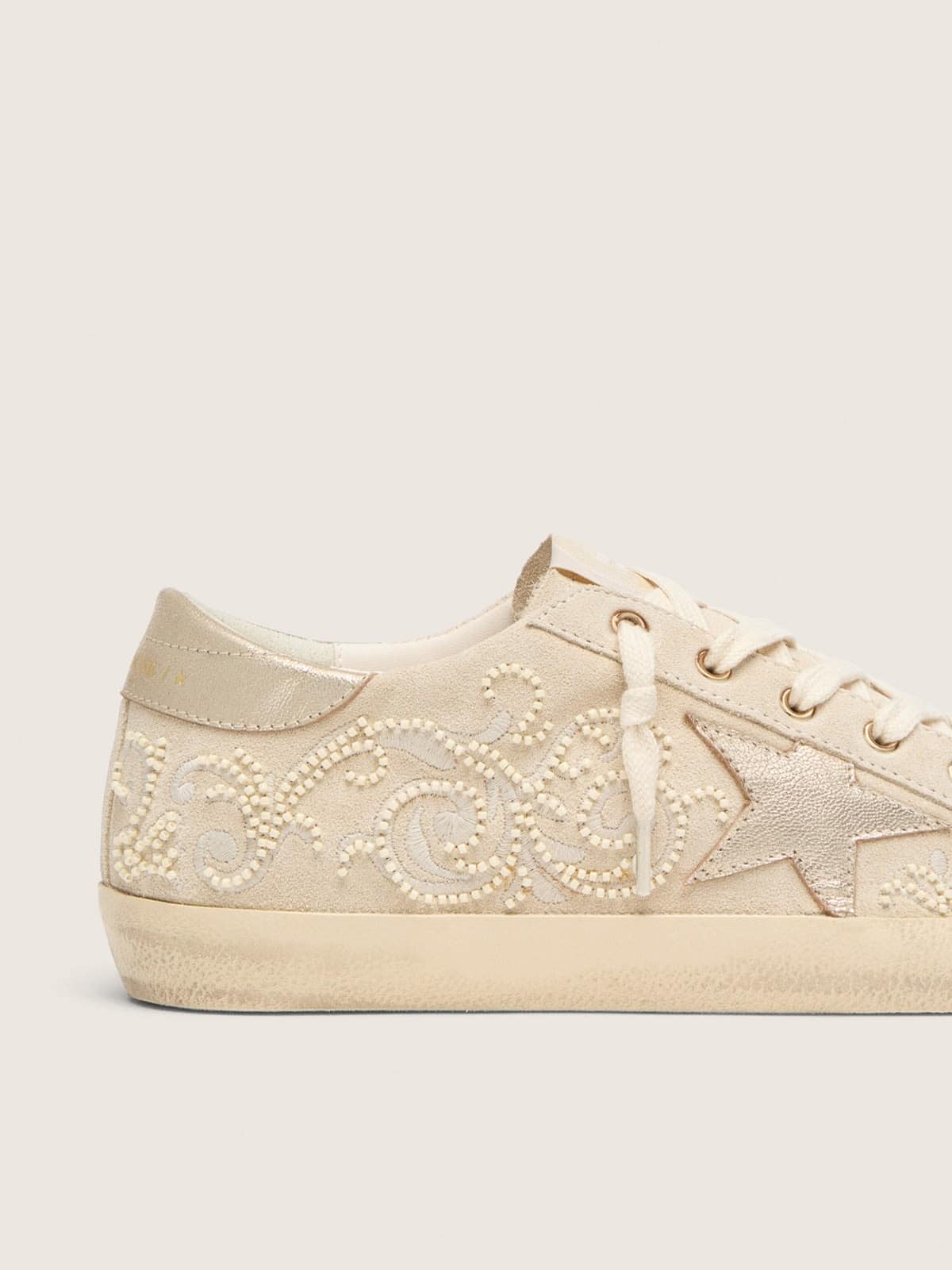 Super-Star LTD pour femme en daim perle avec étoile dorée et broderie de perles