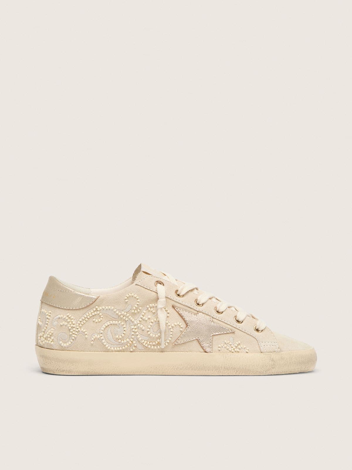 Super-Star LTD pour femme en daim perle avec étoile dorée et broderie de perles