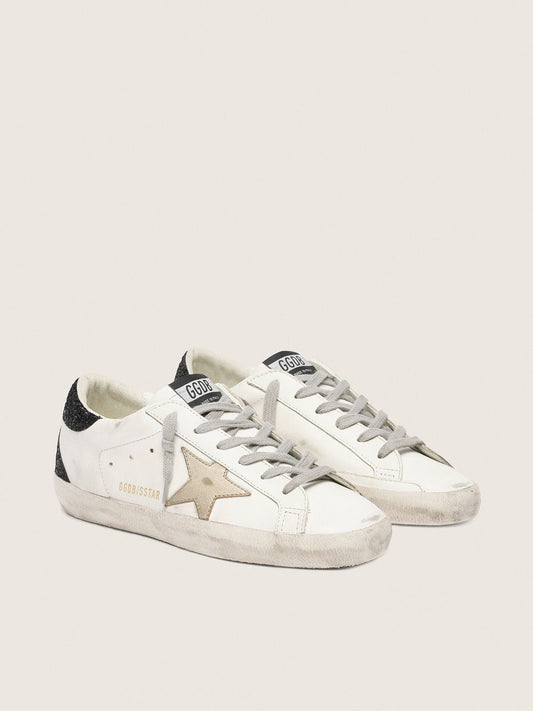 Super-Star pour femme avec étoile dorée et contrefort à paillettes noires