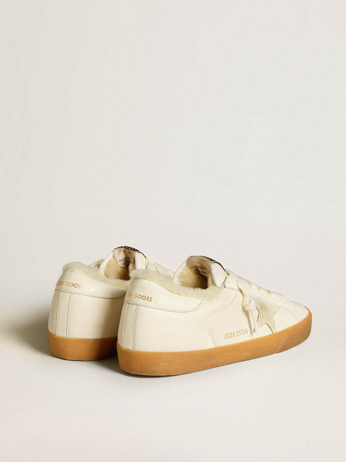 Super-Star en cuir nappa blanc avec étoile en daim et doublure en shearling